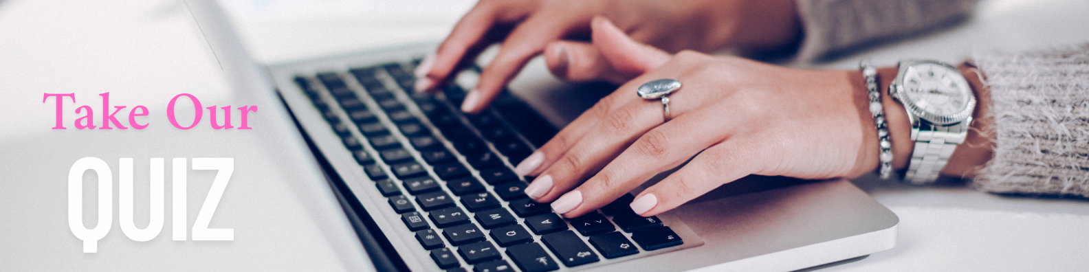 A woman taking a business personality quiz on a laptop to discover income strategies aligned with her entrepreneurial type
