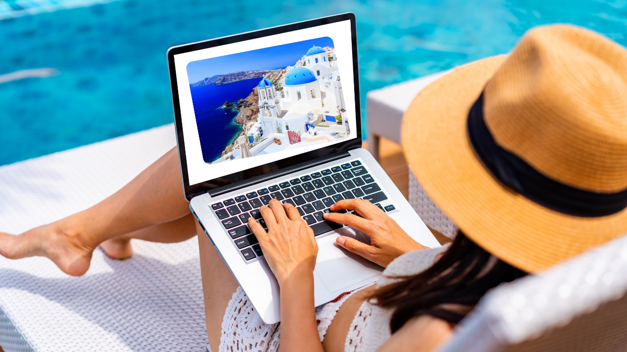 Woman relaxing on a beach in Italy with a laptop, symbolizing earning income through Amazon affiliate links while traveling.